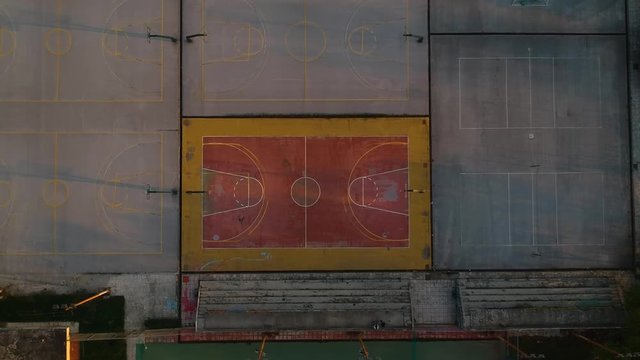 Aerial drone shot over basketball courts in a sports complex in Poseidonio, Thessaloniki Greece