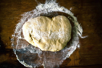 Dough on a wooden board