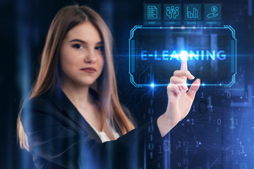 Business, Technology, Internet and network concept. Young businessman working on a virtual screen of the future and sees the inscription: E-learning