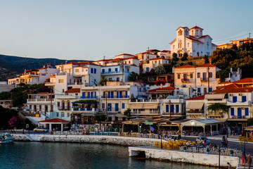 sunset above Batsi, pretty little tourist port of Andros, beautiful Cyclades islands in the heart of the Aegean Sea