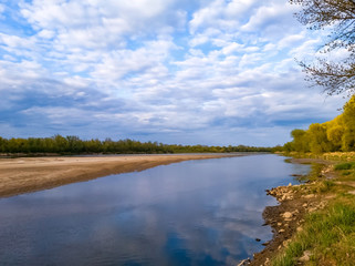 Fototapeta na wymiar Point bar at Vistula river due to unusually low water level at springtime, vicinity of Warsaw, Poland
