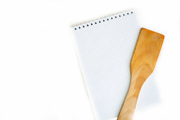 Notebook and kitchen spatula