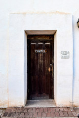 Fototapeta na wymiar Chapel door, exterior Mission San Xavier Del Bac, Tucson, Arizona, USA