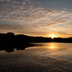 Obraz premium sunset over the lake