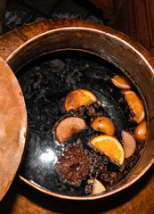 Mulled wine in large pot for sale during Christmas market