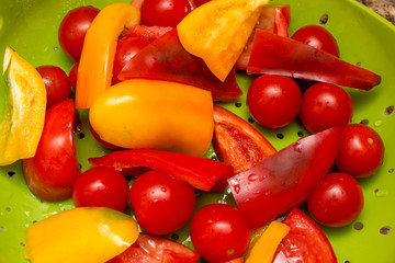 Freshly cut raw vegetables being prepared to be cooked 