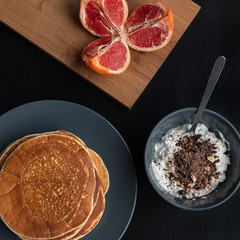 Nutritious breakfast with pancakes and cottage cheese