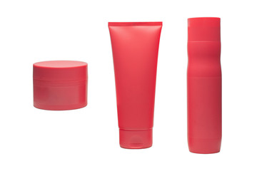 Plastic red bottles on a white background. screw cap, mix collection