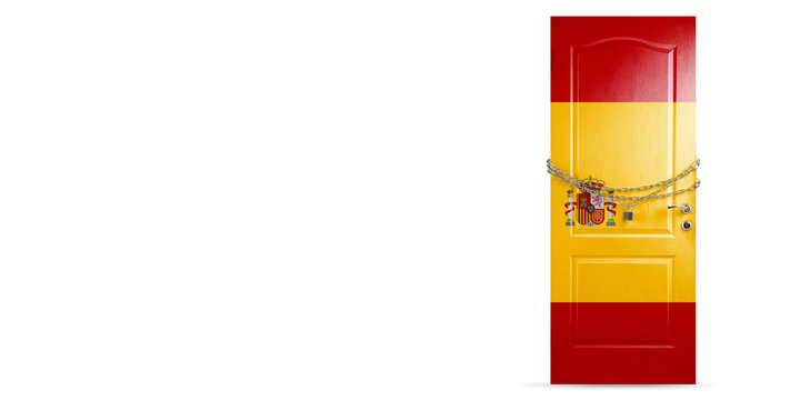 Door colored in Spain national flag, locking with chain. Countries lockdown during coronavirus, COVID spreading. Concept of medicine and healthcare. Worldwide epidemic, quarantine. Copyspace.
