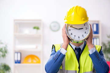 Young male architect working in the office