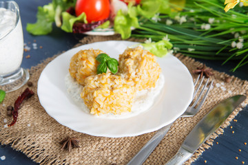 Home meatballs with spices on a concrete background