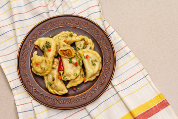Dumplings stuffed stewed cabbage and sour cream. Traditional Ukrainian dish varenyky