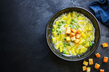 vegetable soup
green peas and small thin pasta vermicelli
Menu concept. food background. top view copy space for text
keto or paleo diet