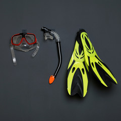 children's diving equipment on a gray background