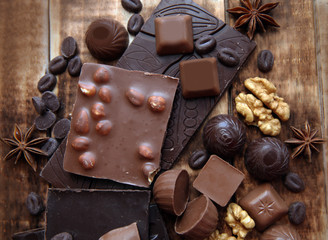 Dark and milk chocolate with nuts. Top view