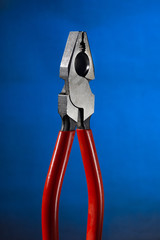 pliers for locksmiths on a blue background