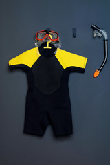 children s diving suit on a gray background