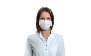 Young female nurse on camera wearing a surgical or medical mask. Doctor wearing a white coat  isolated on white background. covid 19, coronavirus, quarantine