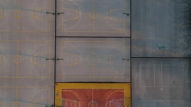 Aerial drone shot over basketball courts in a sports complex in Poseidonio, Thessaloniki Greece