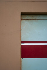 The wall and old metal door 