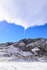 Snow-covered Rockies in the sun from Dinosaur Ridge, Colorado, USA