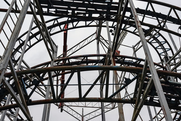Abandoned city amusement park. Roller Coaster.