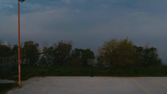 Aerial drone shot over basketball courts in a sports complex in Poseidonio, Thessaloniki Greece
