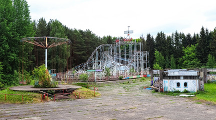 Abandoned city amusement park. Roller Coaster.