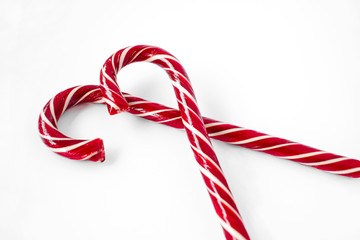 Red Candy canes on a white background