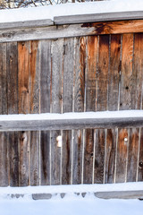 Wooden fence covered with snow, Denver, Colorado, USA