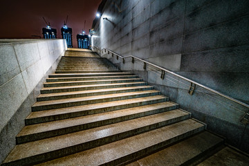 stairs leading upstairs against the backdrop of urban development