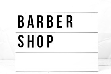 Vintage Barber Shop Sign on Retro Looking Board. Gentleman Hipster Grooming