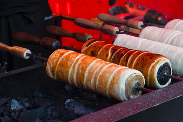 Kurtos kalacs or chimney cakes, preparing cooking