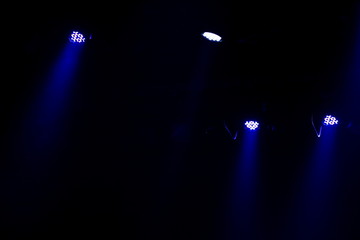 scene, stage light with colored spotlights and smoke