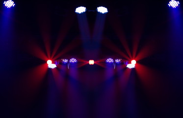 scene, stage light with colored spotlights and smoke
