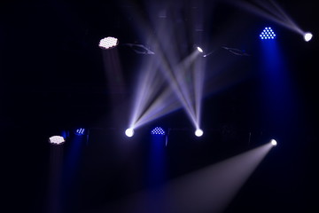scene, stage light with colored spotlights and smoke