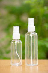 Plastic blank bottle on wooden table.