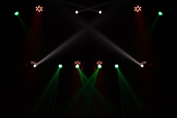 Theater lights spotlights over the stage, texture background for design.