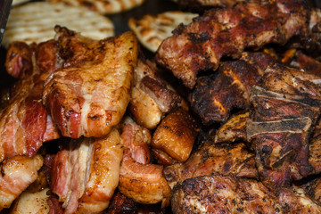 Unhealthy, greasy, oily, mix of meat slices