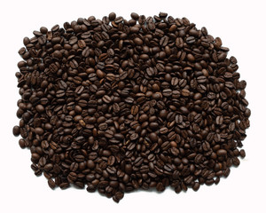 Coffee beans lying on white isolated background