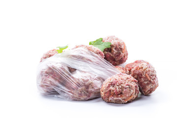 frozen raw meatballs from beef and pork with carrots and rice