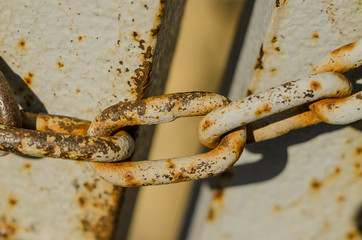 Old metal chain. Chain links close up. Concept of restrictions, quarantine, closing
