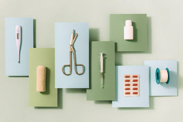 Top view of various medical items on colorful background.