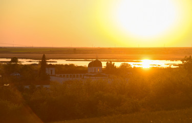 Fototapeta na wymiar Orthodox church in a beautiful sunset 