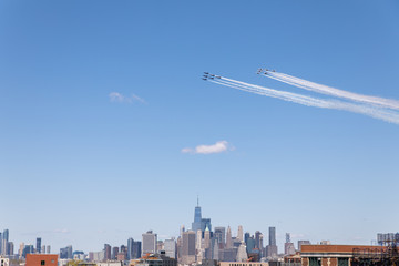 Brooklyn, New York / USA - 04-28-2020 The blue angels and the thunderbirds fly over NYC as a...
