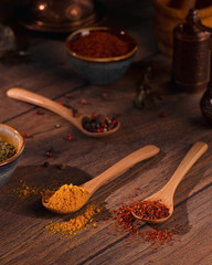 Vertical closeup of saffron, mint and basil spices