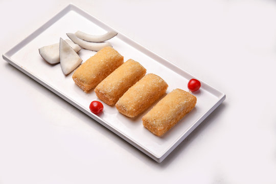 cake in white tray with flavor of coconut