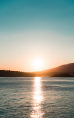 Sunset over the ocean and horizon 