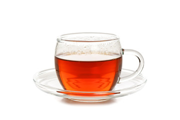 Studio shot of a glass cup of tea isolated on a white background in close-up