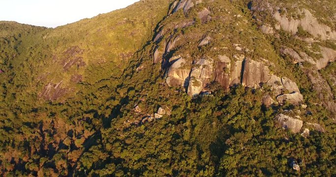 Drone shot of a mountain with the sunset light